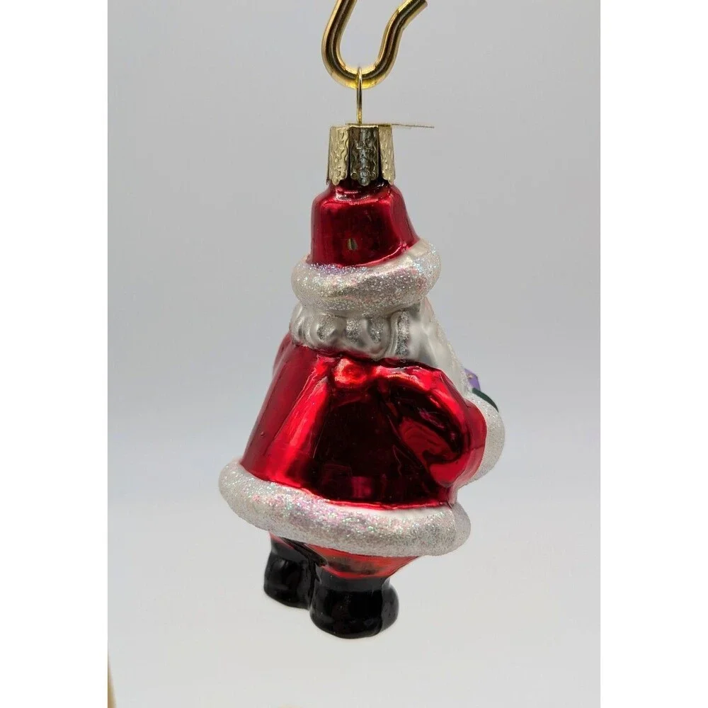 OLD WORLD CHRISTMAS Blown Glass Santa Claus Holding Gift Ornament 4